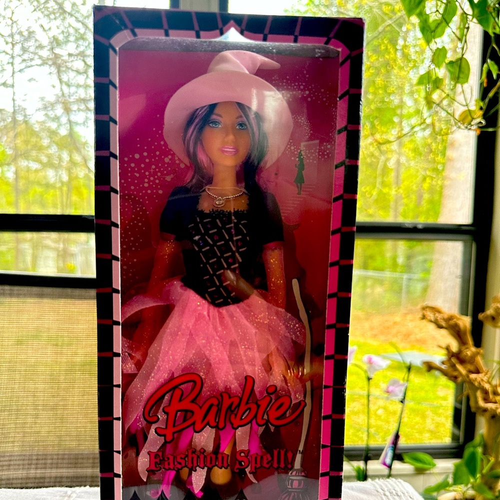 Barbie fashion spell with a pink hair brush